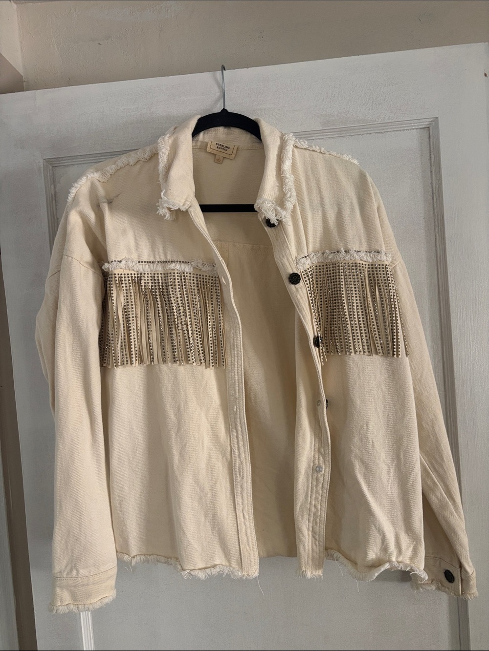 White denim jacket with sequin fringe
